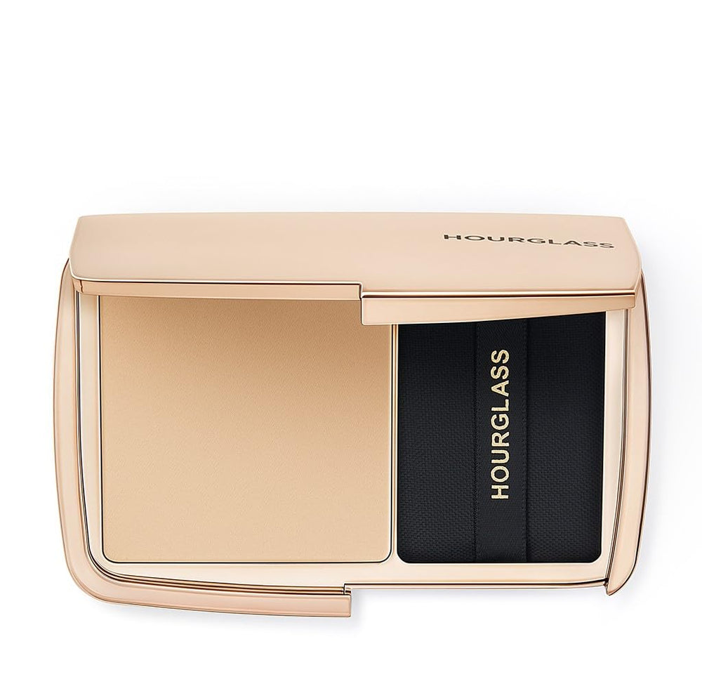 Hourglass Vanish Poudre Translucide Compacte: fini mat et retouche instantanée.