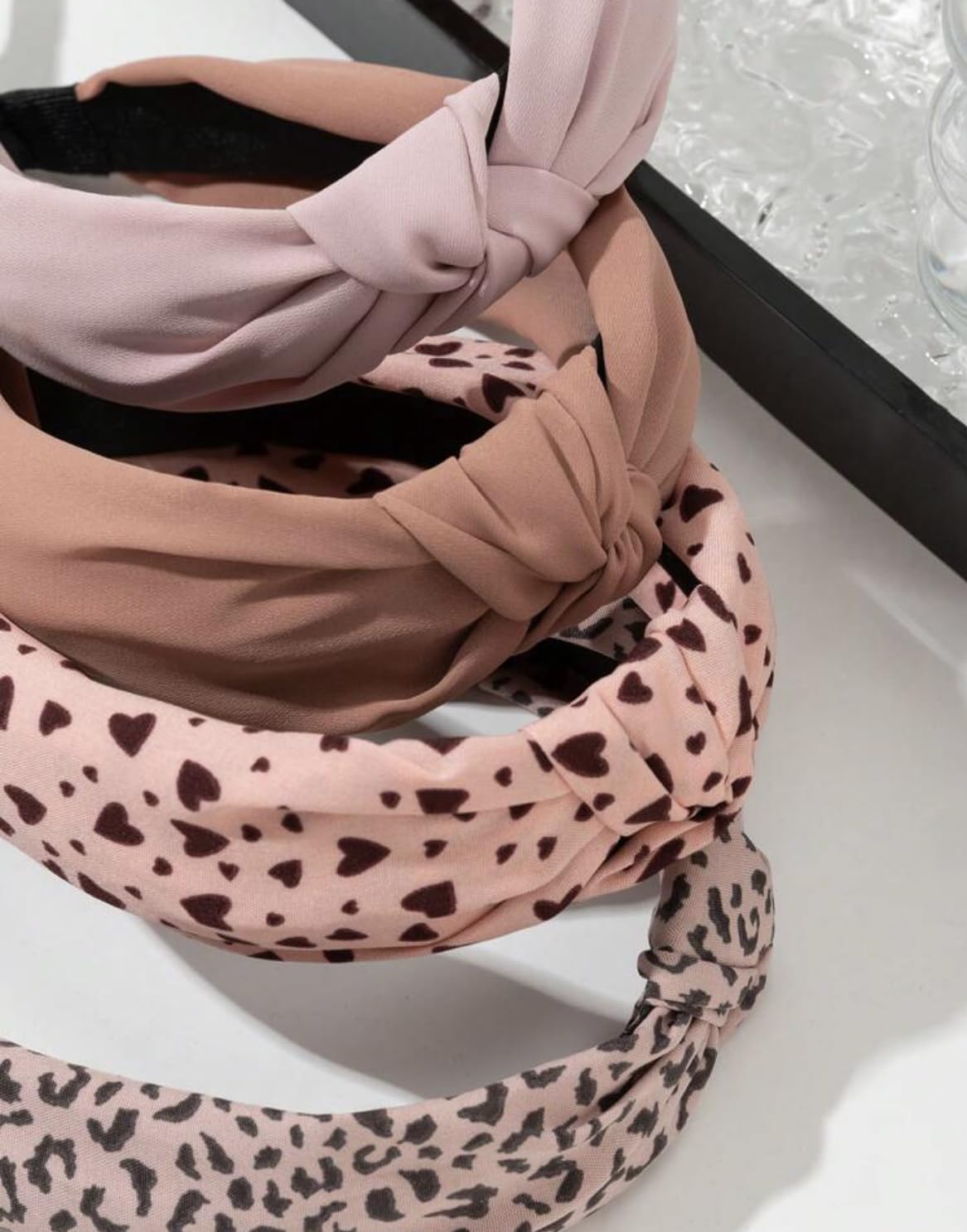 Huachi bandeau cheveux nœud haut, look chic et coiffure rapide.