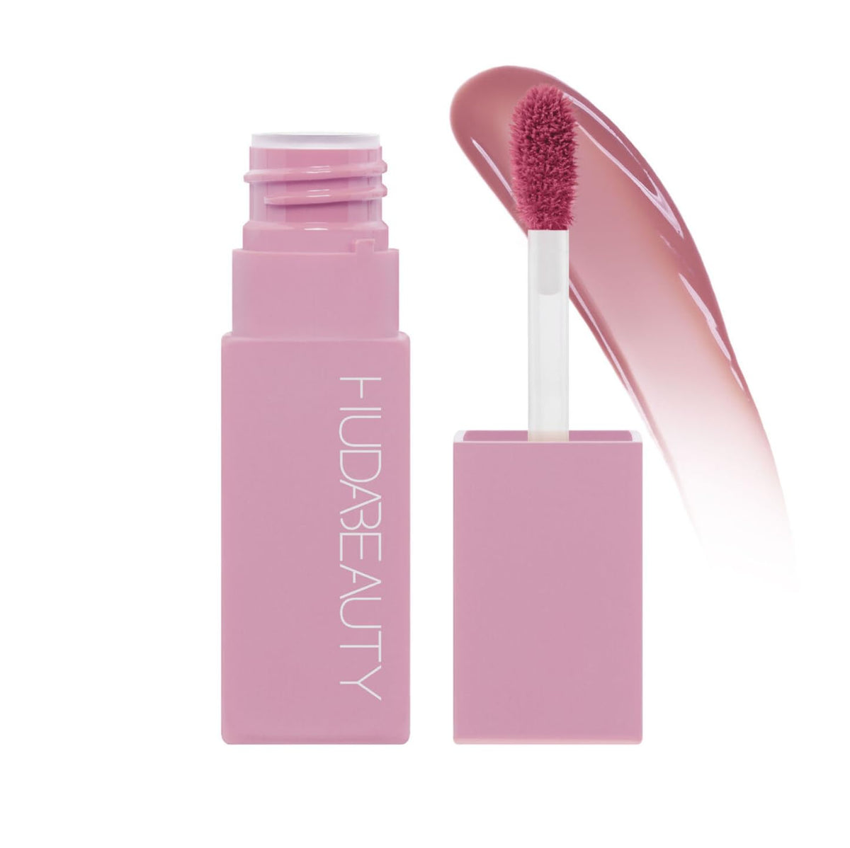Huda Lip Blush Rosy Kiss texture crème soyeuse, application douce et confortable.