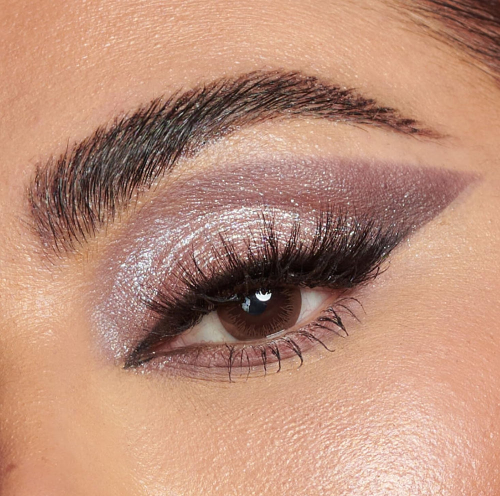Huda Rose Quartz gloss perle hybride pour éclat nacré et fini lisse.