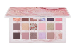 Huda Rose Quartz palette 18 ombres pour des regards intenses et faciles à assortir.