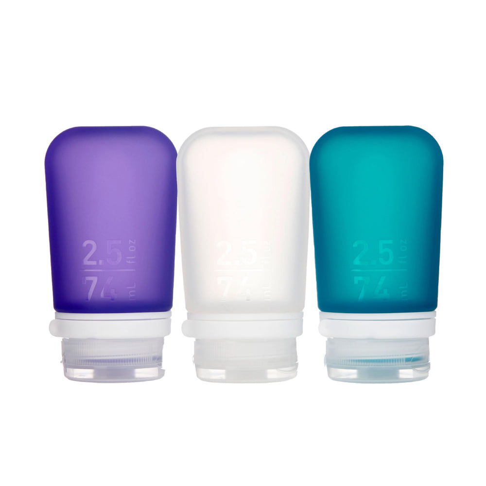 GoToob+ Humangear en clair, bouteille de voyage pratique et facile à remplir.