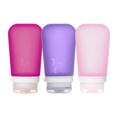 Humangear GoToob+ en rose, bouteille réutilisable pratique pour les voyages et le plein air.