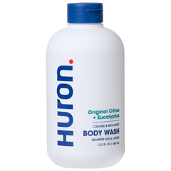 Gel douche Huron pour homme, bouteille citron-eucalyptus, rafraîchissant et énergisant.