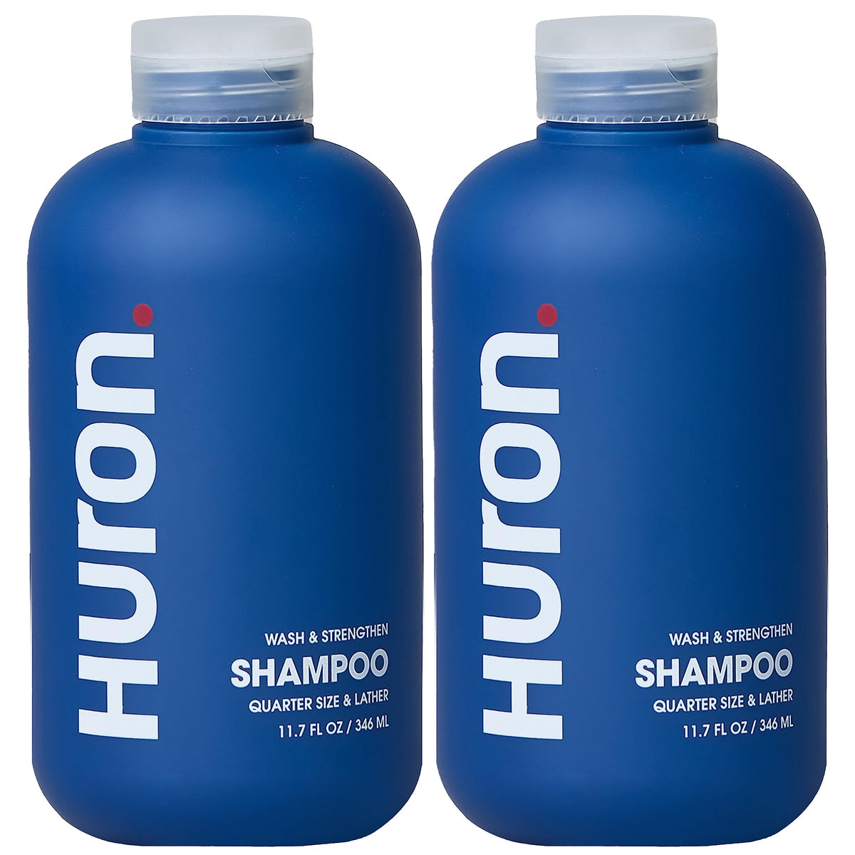 Shampoing Huron Citrus Bois pour homme, bouteille et étiquette visibles, hydratation potentielle.