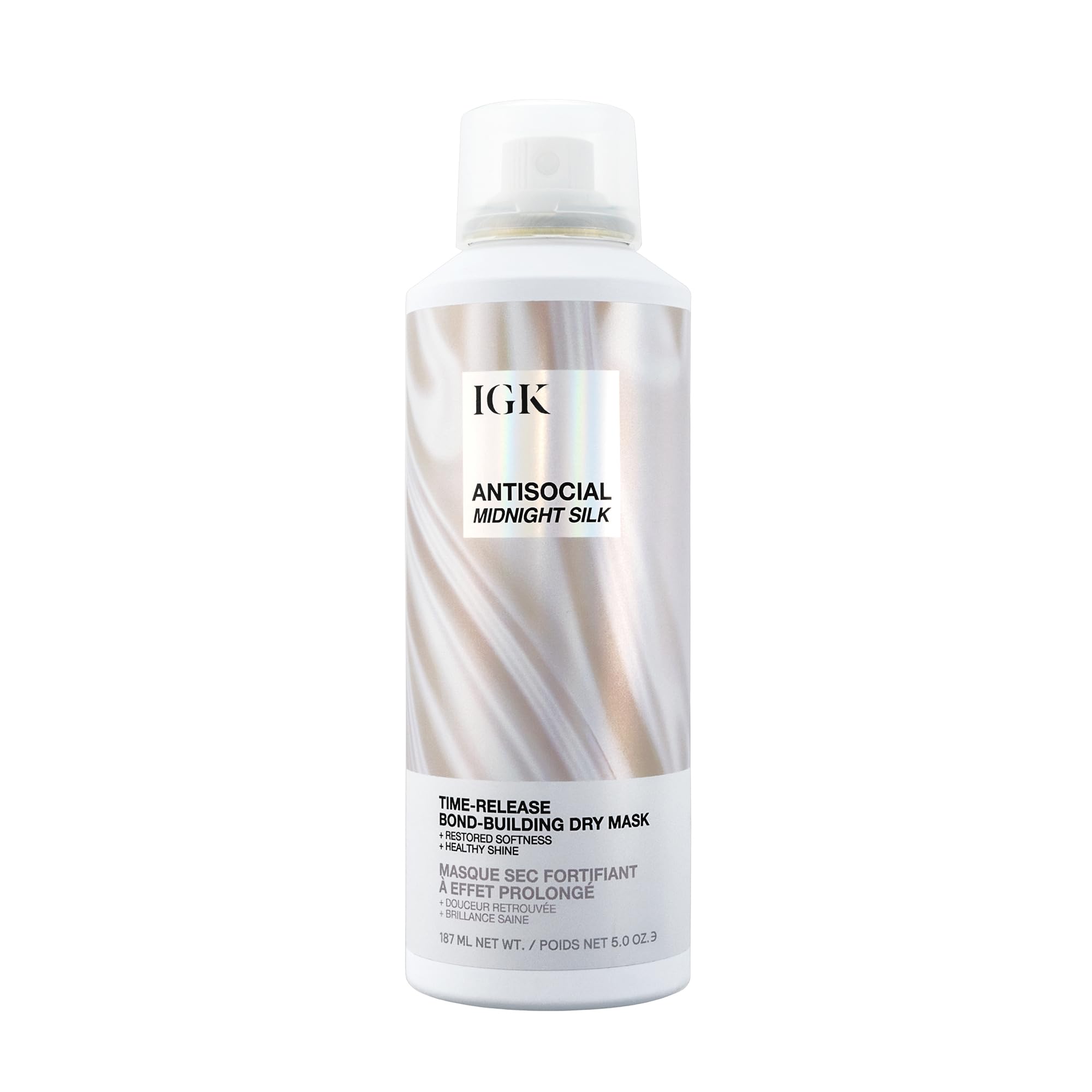 IGK Antisocial spray sans rinçage sur cheveux secs pour hydratation rapide et brillance.