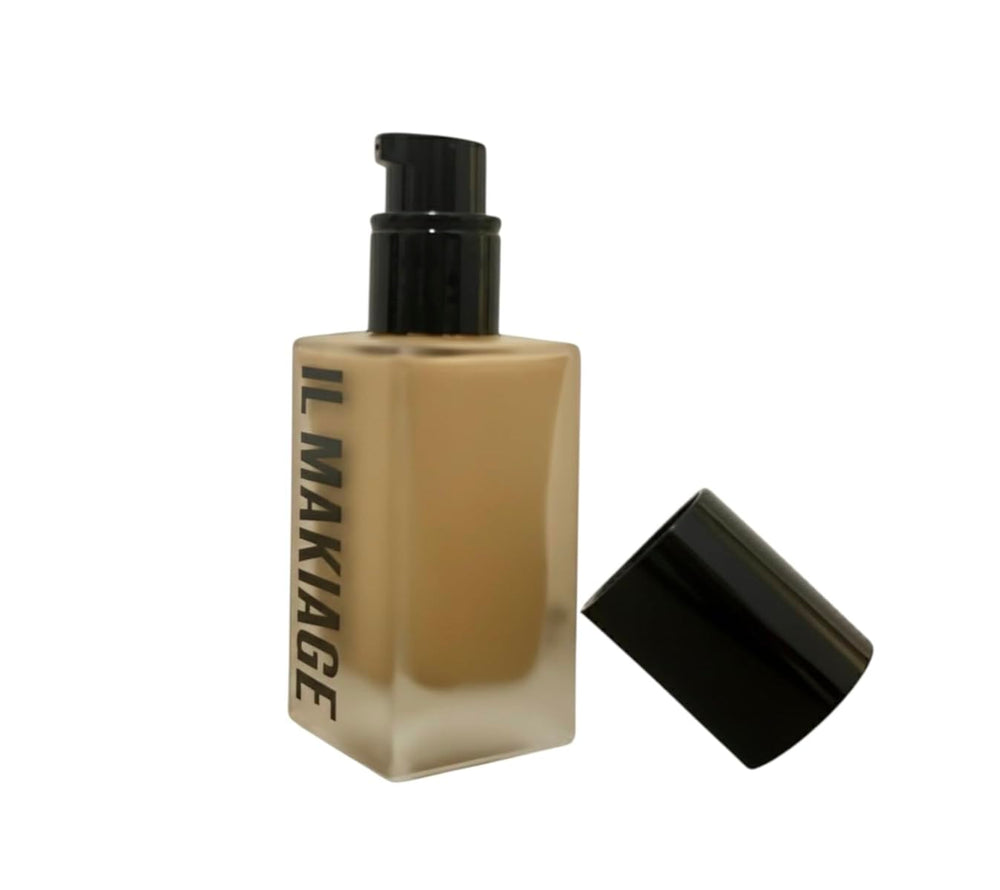 Il Makiage Woke Up Like This Flawless Base - bouteille élégante, texture fluide pour un teint uniforme.