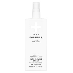 Iles Formula Curl Revive: crème légère pour définir les boucles avec douceur.