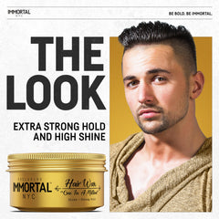 Main appliquant Immortal NYC One In A Million sur les cheveux pour un contrôle précis.