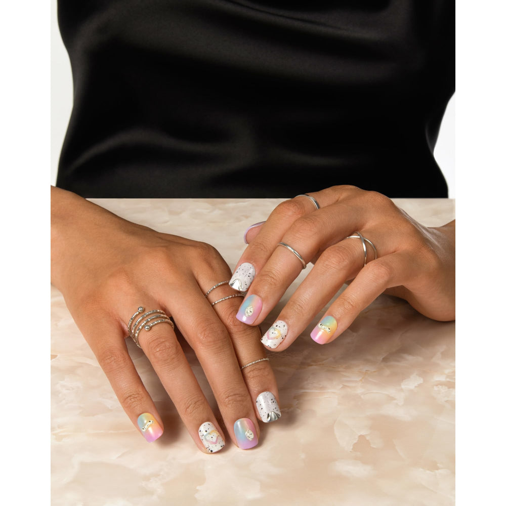 Détails pierres solitaire imités sur les ongles imPRESS.