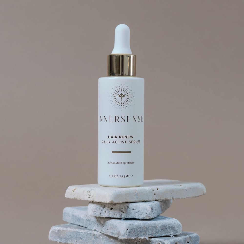 Application du sérum : massage du cuir chevelu pour favoriser la circulation.