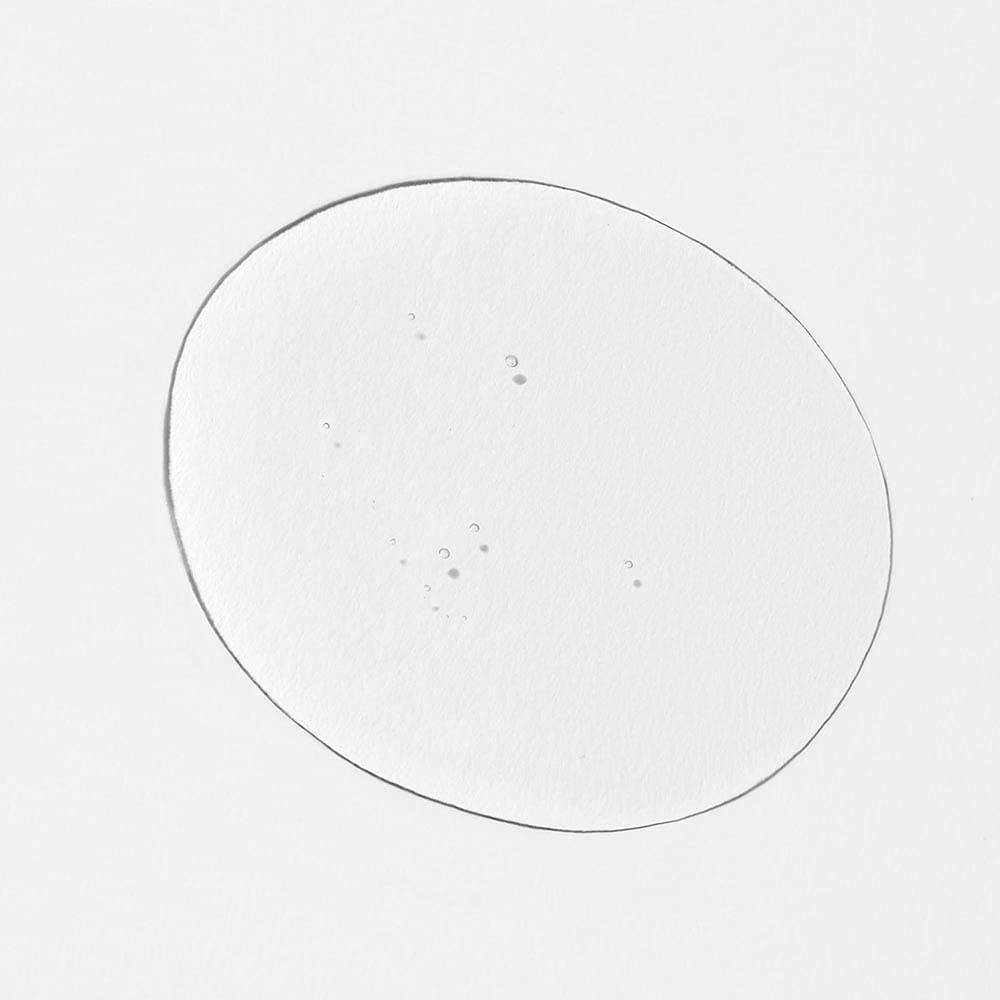 INNERSENSE huile traitante naturelle, goutte dans les mains, soin capillaire nourrissant