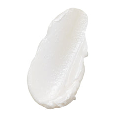 Texture crèmeuse du soin sur les longueurs offre douceur et brillance naturelle.