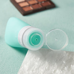 INSFIT bouteilles voyage silicone rose 2 oz, parfaites pour gel douche et après-shampoing.