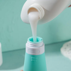 INSFIT bouteilles voyage silicone vert 2 oz, durables et faciles à transporter.