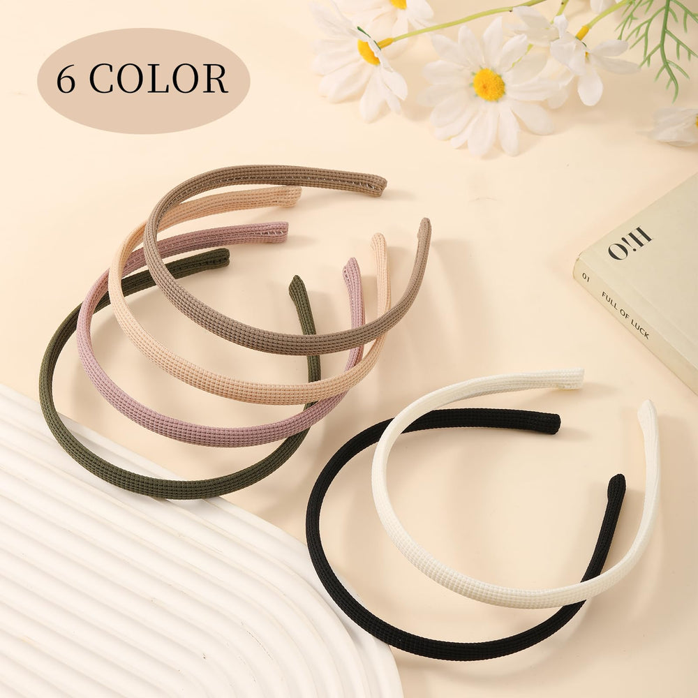 Bandeau fin vert-foncé Interesse, cadeau pratique et élégant.
