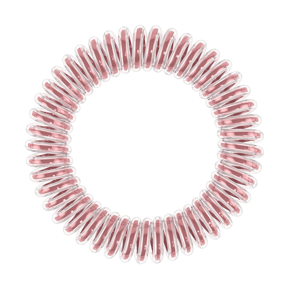 Couleur Bella Rosa d'invisibobble Original Traceless Spiral pour cheveux délicats.