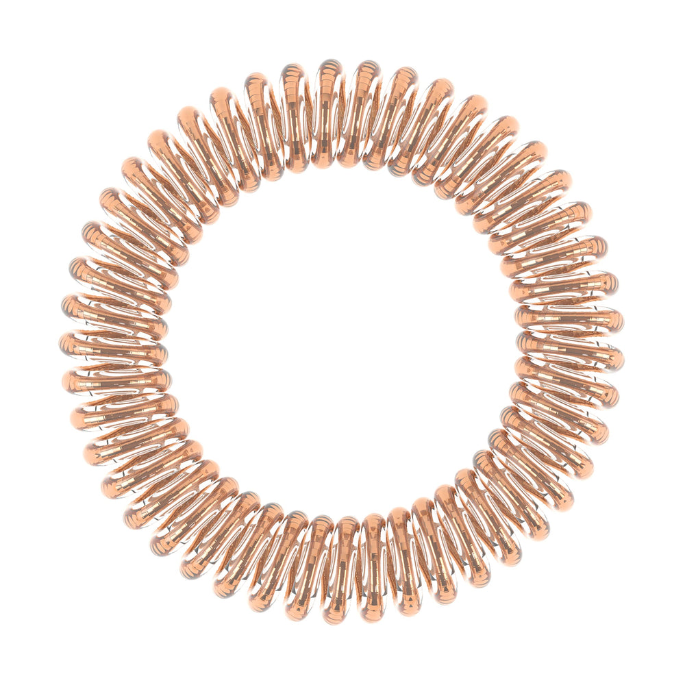 Couleur Bronze d'invisibobble Original Traceless Spiral, polyvalente et éclat naturelle.