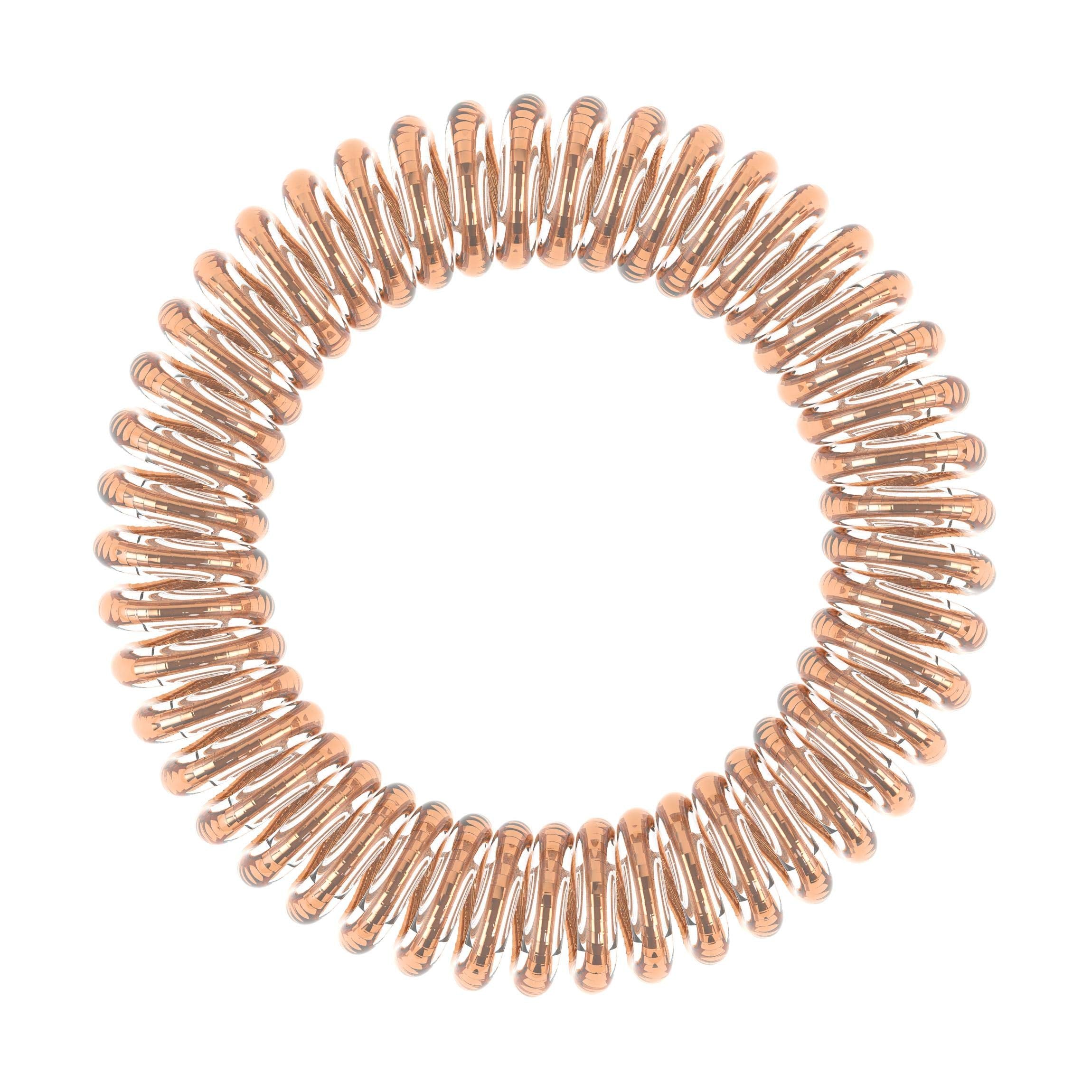 invisibobble SLIM Bronze Me Pretty portée comme bracelet, accessoire élégant et pratique