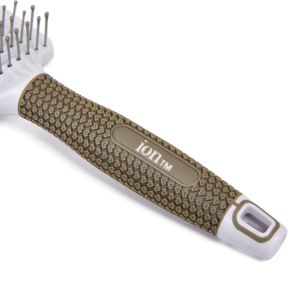 Brosse Ion Blowout séchage rapide grâce à la forme ventilée.