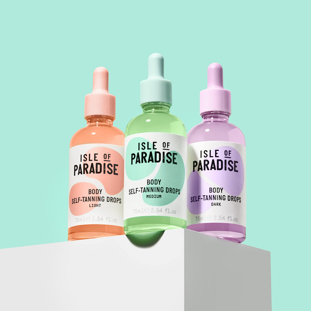 Teinte Claire d'Isle of Paradise pour un bronzage subtil et lumineux.