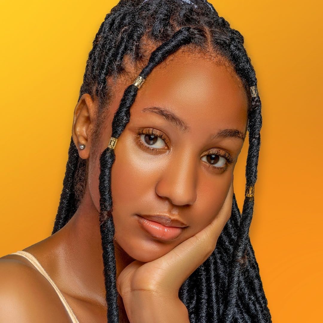 Tresses et locs bénéficient d'une hydratation légère avec l'huile ricin noire