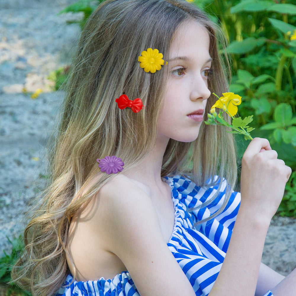 Barrettes Janinka avec formes mignonnes, idéales pour enfants et coiffures festives.