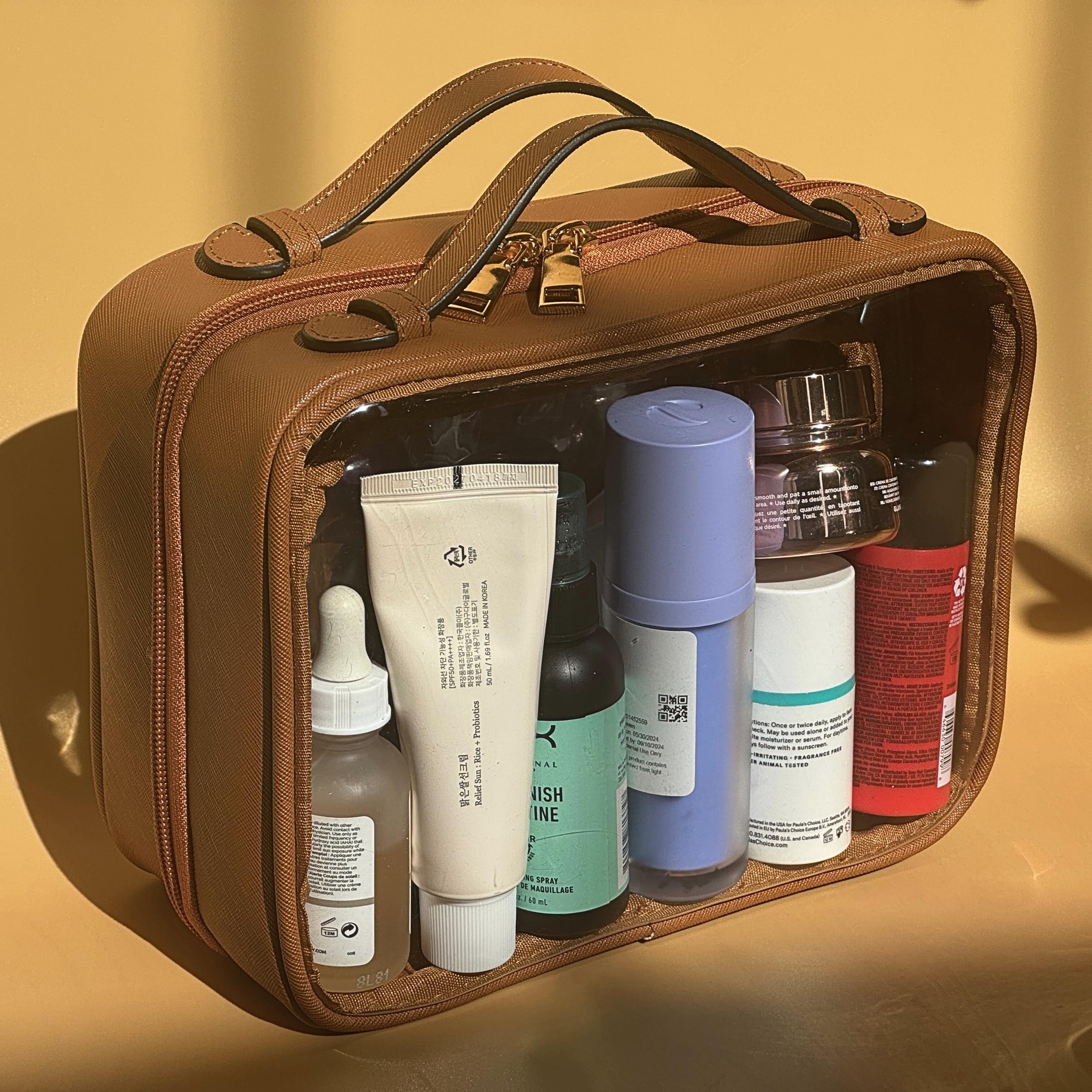 Trousse de toilette transparente JAZD, grande capacité pour soins et maquillage.