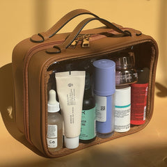 Trousse de toilette transparente JAZD, grande capacité pour soins et maquillage.