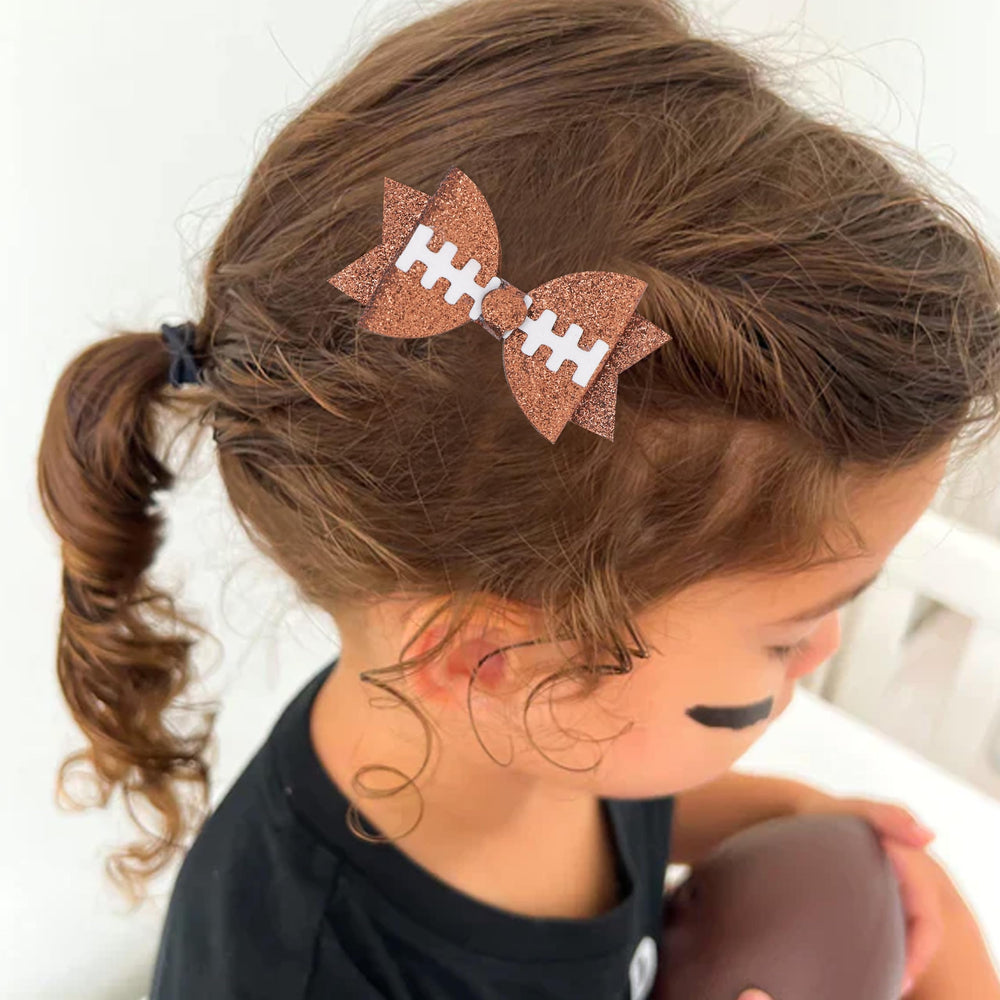 Barrette football paillettes argentées de JISSOO, idéale pour les occasions spéciales.
