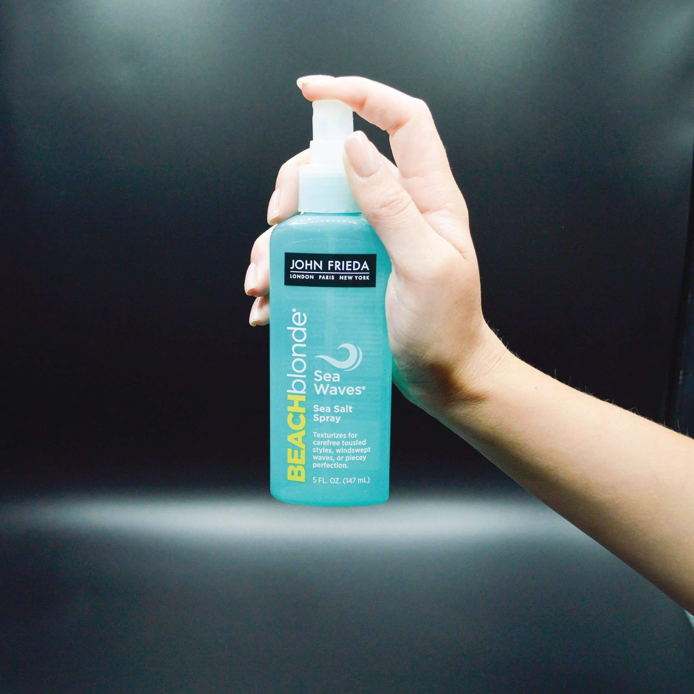 John Frieda utilisation sur cheveux humides avec diffuseur pour un fini naturel.