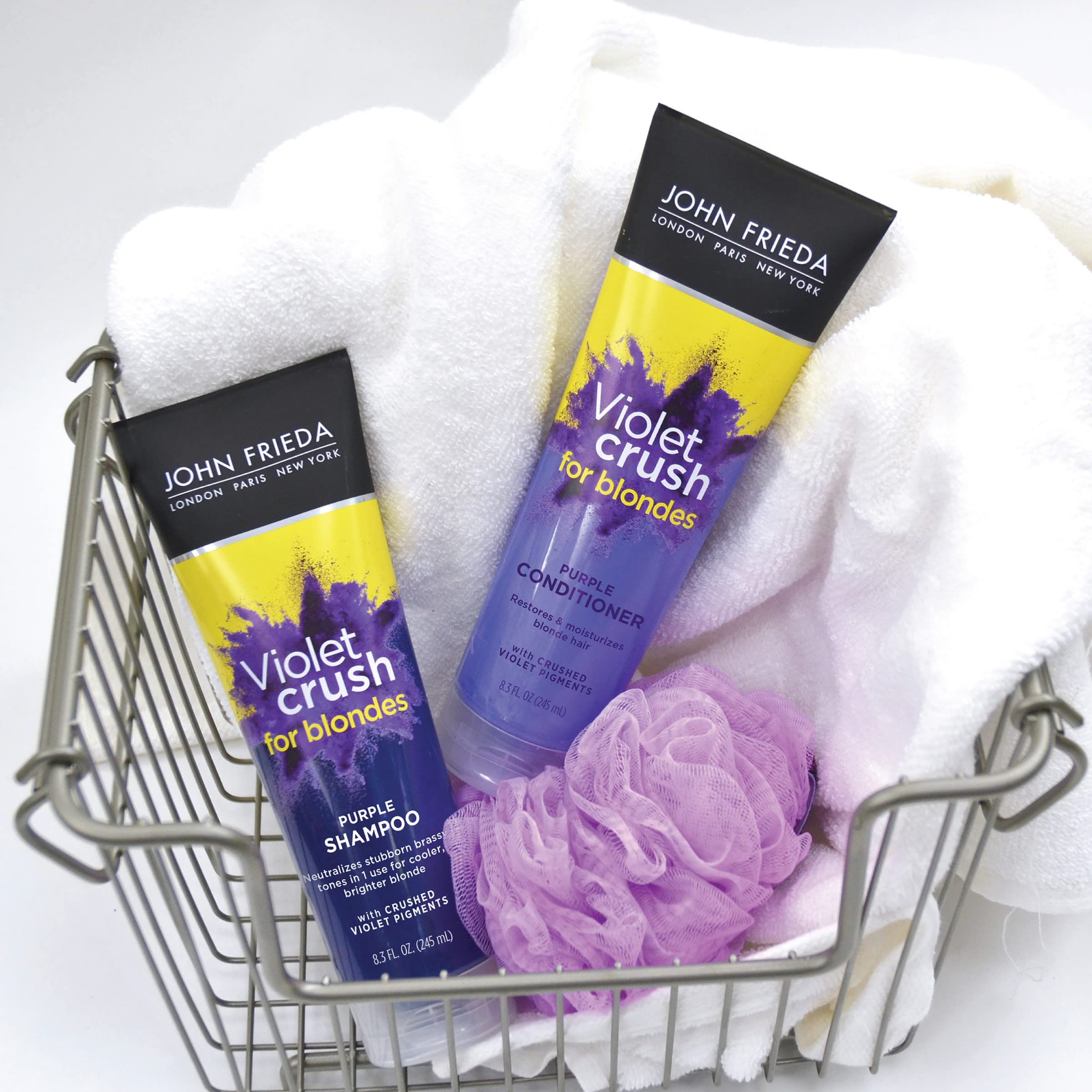 John Frieda Violet Crush purple pigments visibly neutralize brassiness in blonde hair.