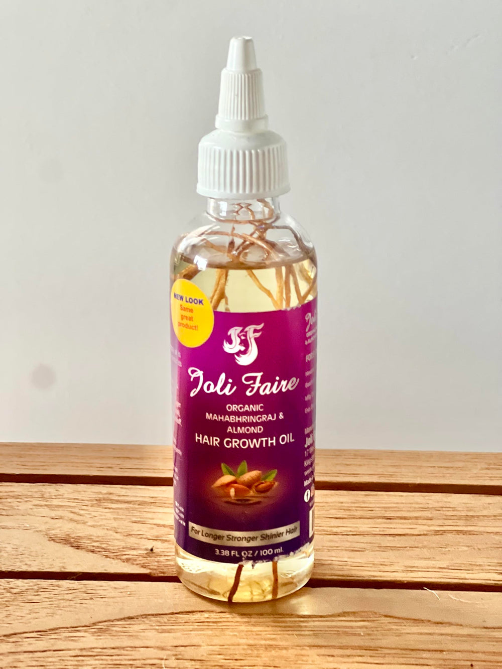Huile Joli Faire Hair pour cheveux brillants et doux après utilisation.