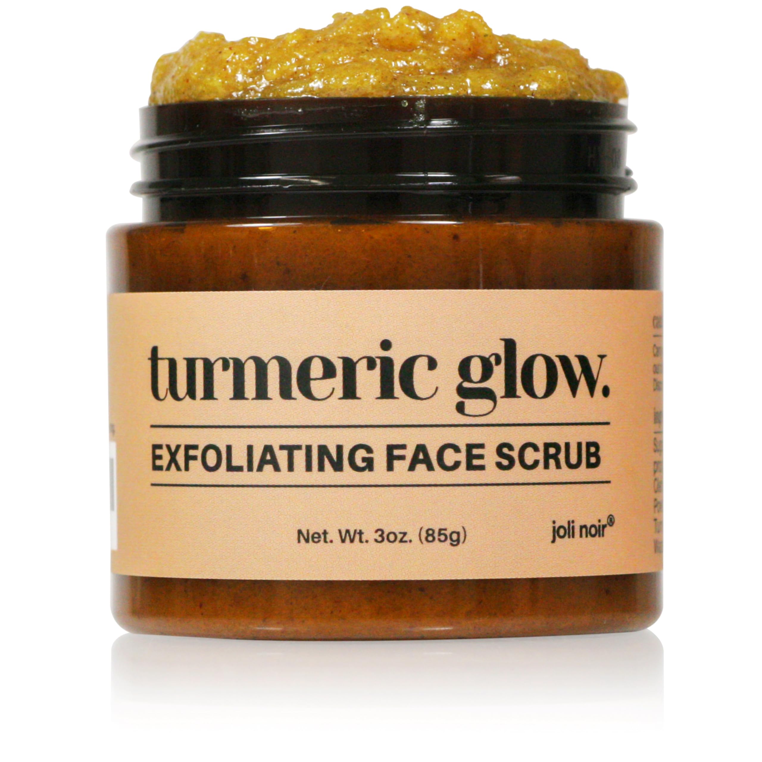 Joli Noir gommage turmeric sur bouteille, routine visage douce.