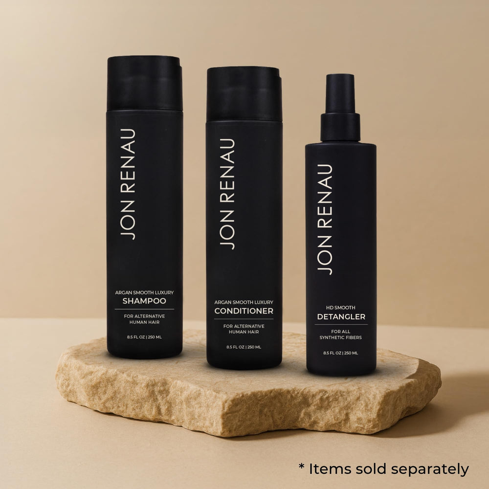 Wig care setup featuring Jon Renau Argan Smooth Luxury Conditioner on display