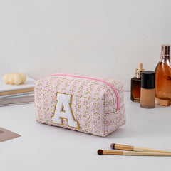 Ouverture à fermeture éclair du sac maquillage rose floral, pratique pour accéder rapidement