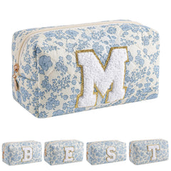 Sac JOVAKIT Alphabet fleuri bleu ouvert, intérieur spacieux pour produits quotidiens.