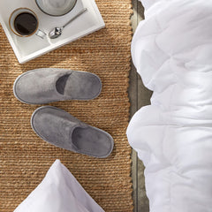 Chaussons Juvale hygiéniques, emballage individuel garantissant propreté.