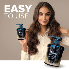Applying Kalive Hair Mask to damp hair for nourishment.