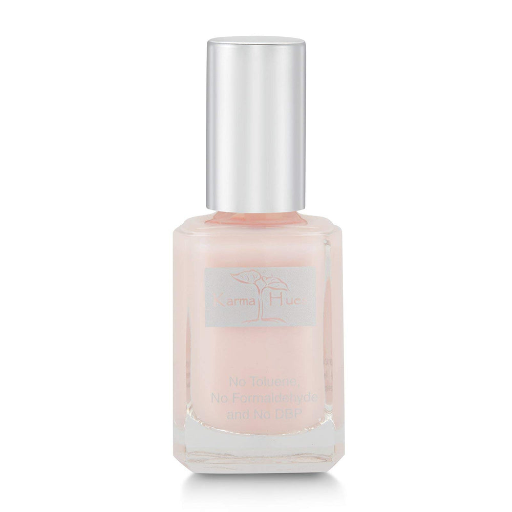 Vernis Karma Organic naturel en bouteille verre, fini brillant et sans toxiques.