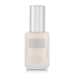 Vernis Karma Organic Heavenly Haze en bouteille, couleur naturelle et durable.