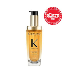 Application de l'huile Elixir Ultime sur les longueurs et pointes.