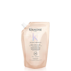 Kérastase Gloss Absolu – bouteille lumineuse pour cheveux brillants et hydratés après chaque lavage.