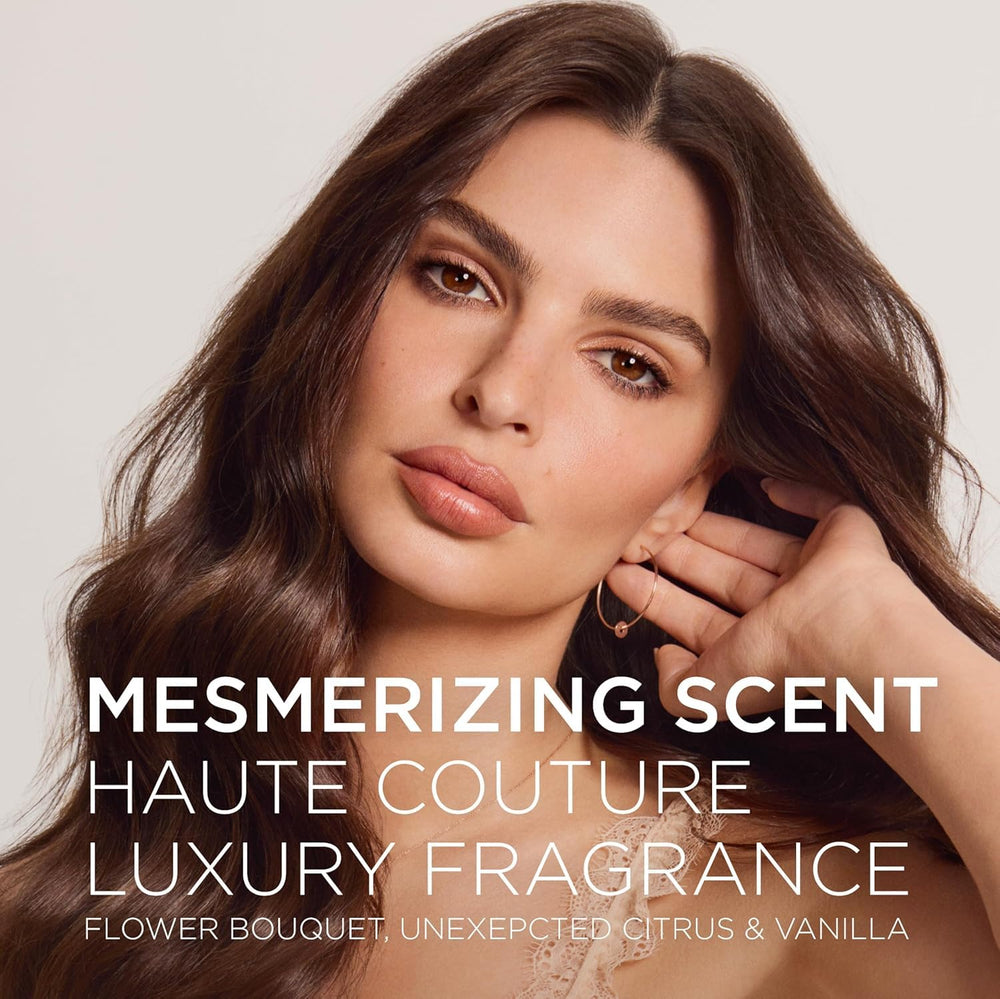 Application du Gloss Absolu Milk sur cheveux pour démêlage efficace.