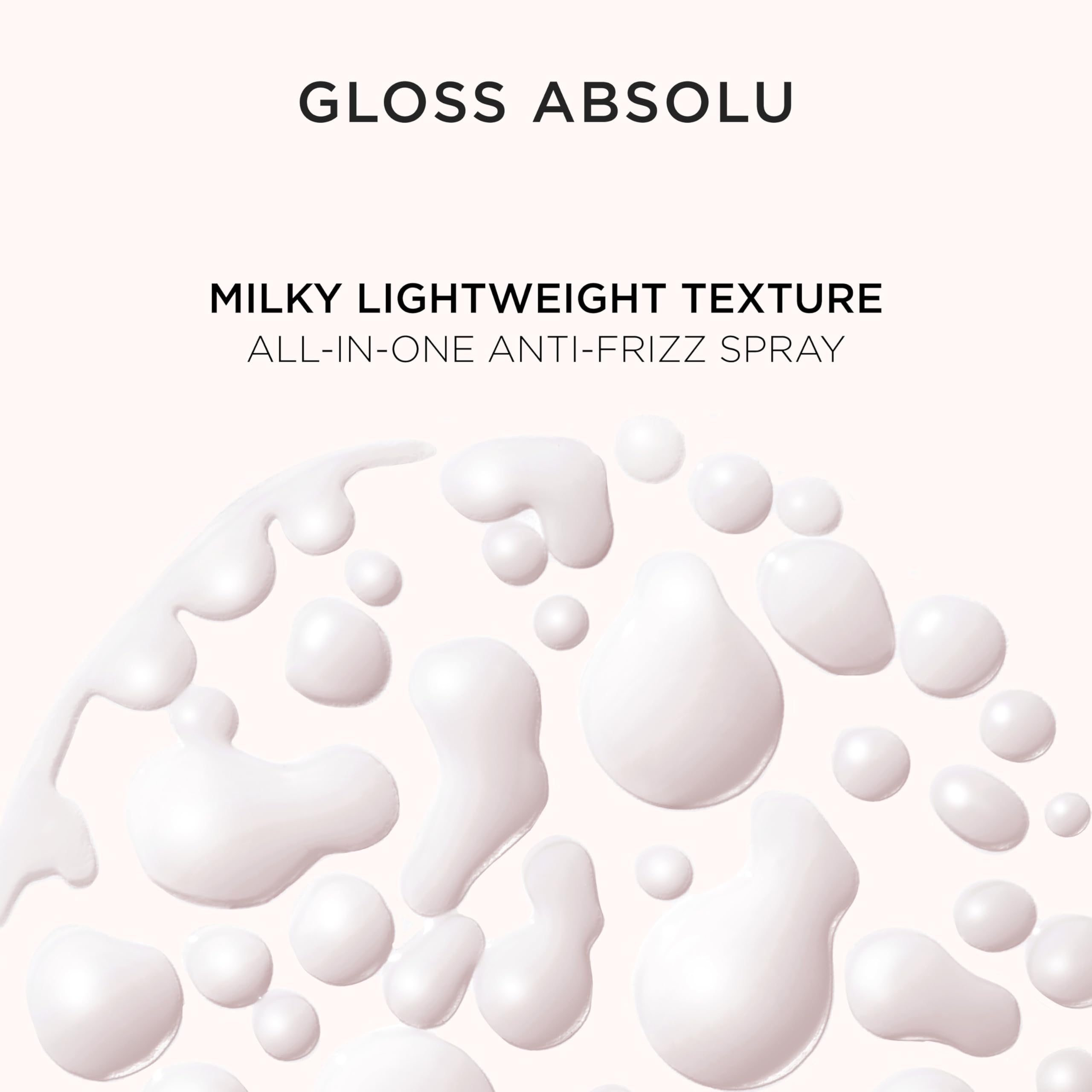 Longueurs resplendissantes et lisses grâce au lait Gloss Absolu.