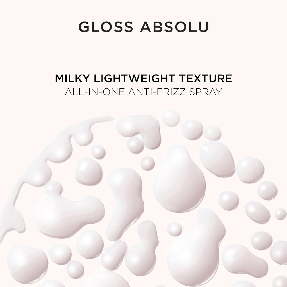 Longueurs resplendissantes et lisses grâce au lait Gloss Absolu.
