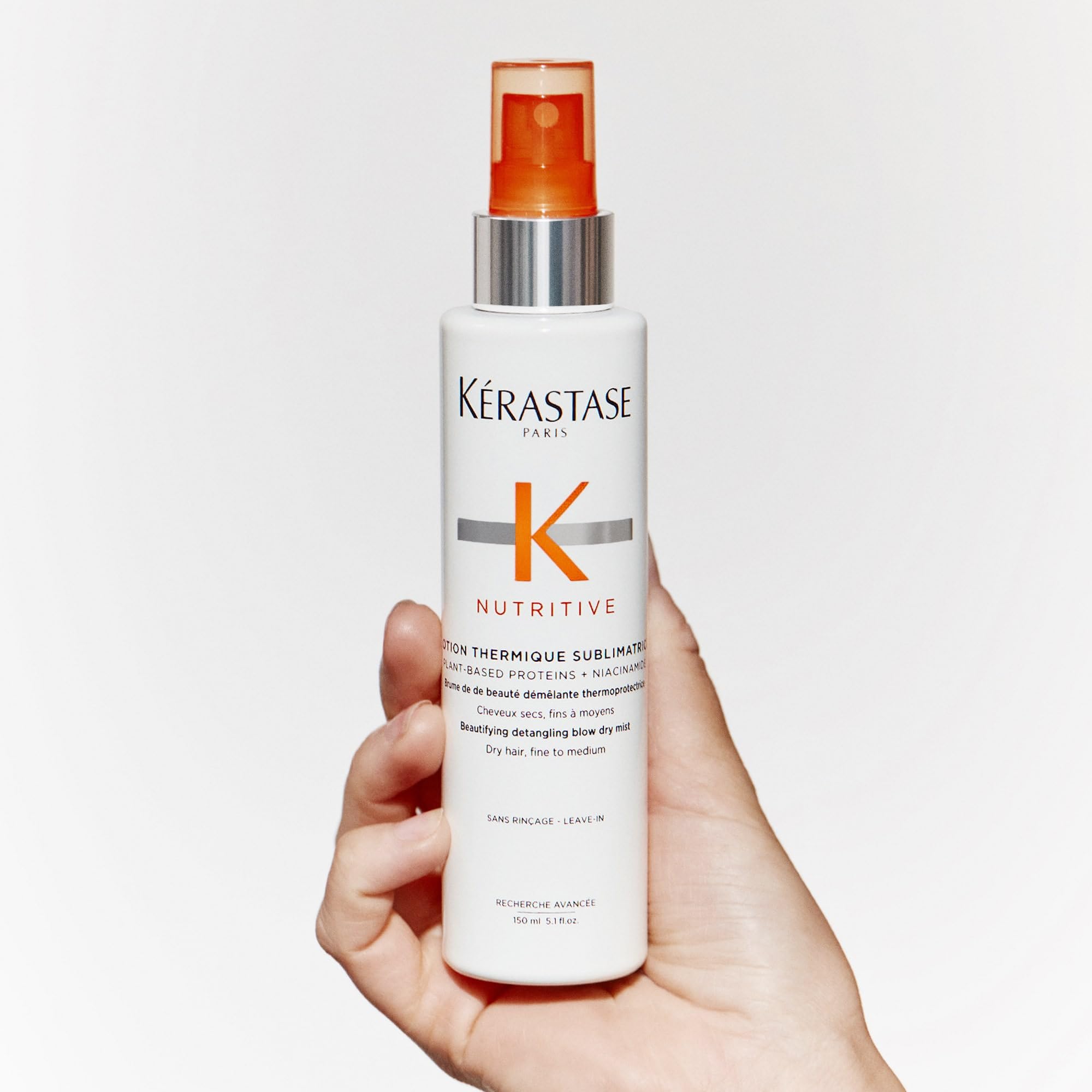 Cheveux brillants et doux après le séchage avec le soin Thermique Nutritif.