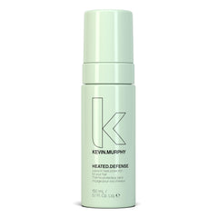 KEVIN.MURPHY Heated.Defense : bouteille versée montrant une protection thermique efficace.