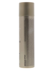Application manuelle du Session Spray pour démarrer le coiffage.