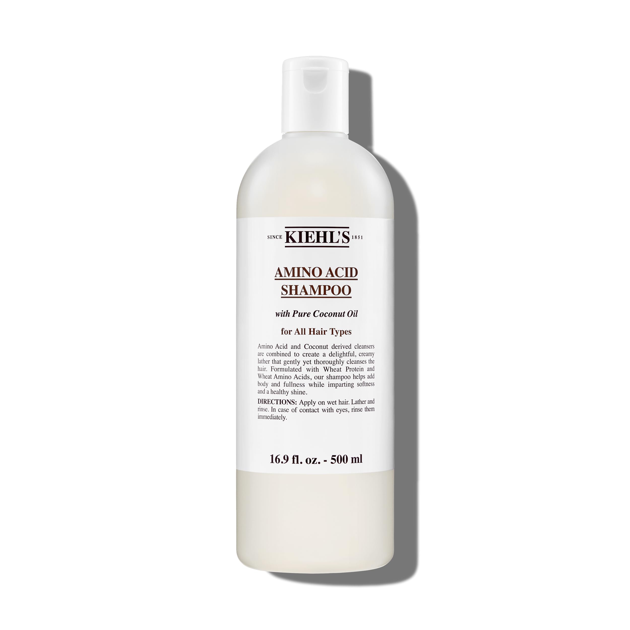 Flacon Kiehl's Amino Acide Shampoo pour une hydratation douce des cheveux.